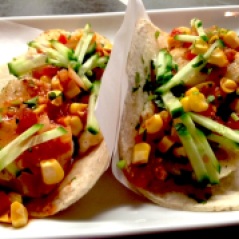 Fresh fish tacos with roasted corn and crisp cucumbers